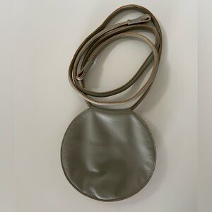 are studio disc bag / fanny bag / wristlet / over-the-shoulder / crossbody purse